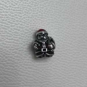 Retired Santa Claus pandora charm.
